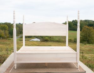 4 Poster bed with turned posts and arched headboard