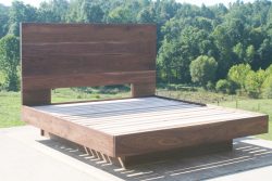 floating walnut platfrom bed angled view