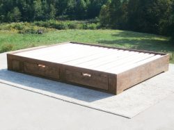 angled view natural Low profile storage bed with 4 drawers