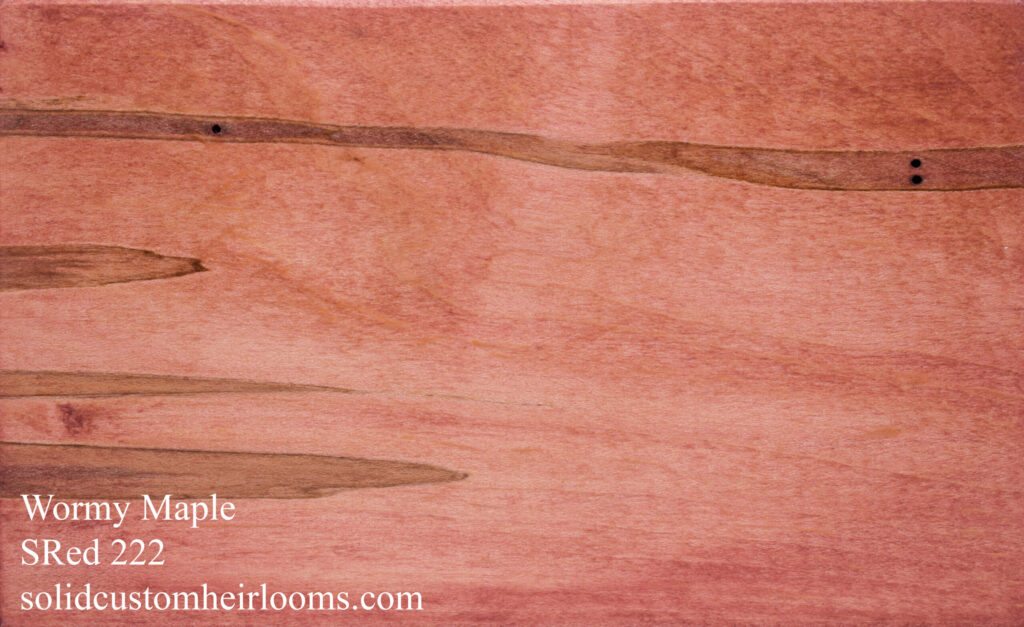 wormy maple with a faded pale red stain