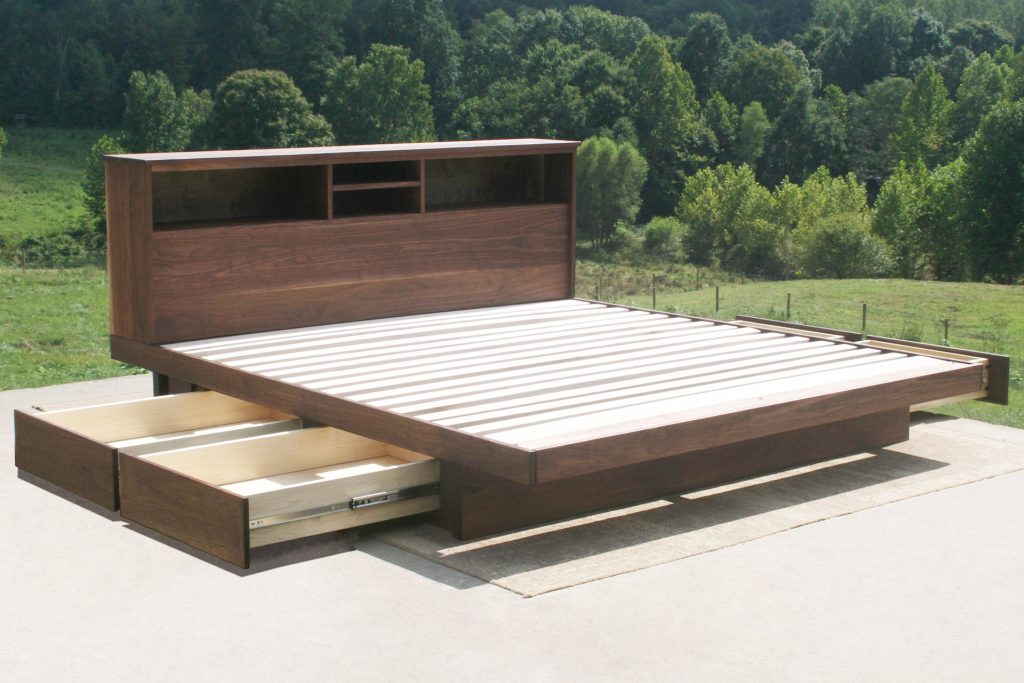 cantilever storage bed with 4 drawers open and headboard
