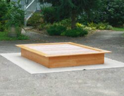 Low Platform Bed with no headboard and wide platform extensions side view