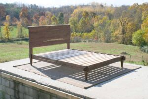 Raised platform bed with a mortise and tenon system side view