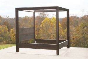 Modern canopy bed with compound angle joints