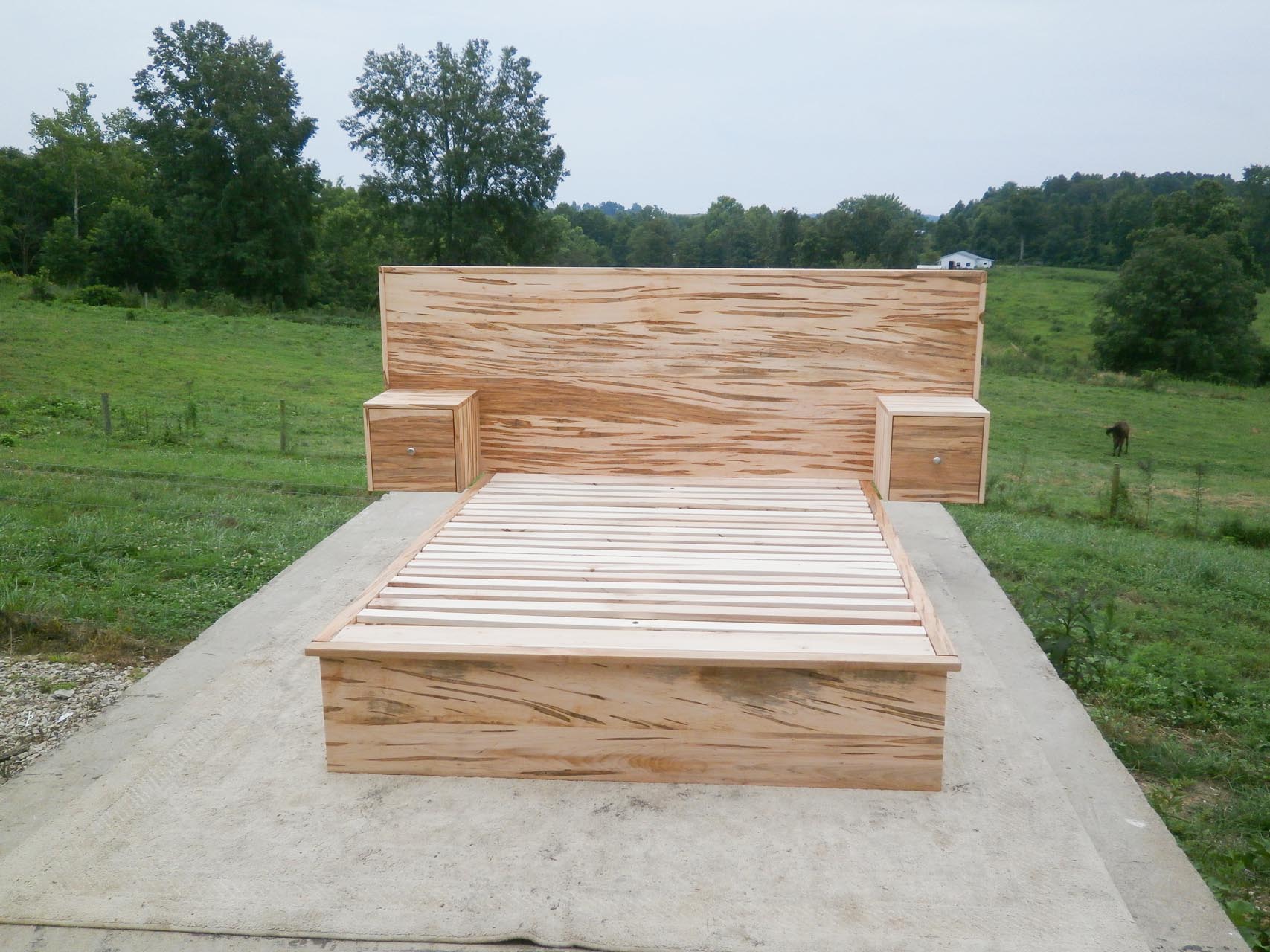 bed with headboard and built in nightstands