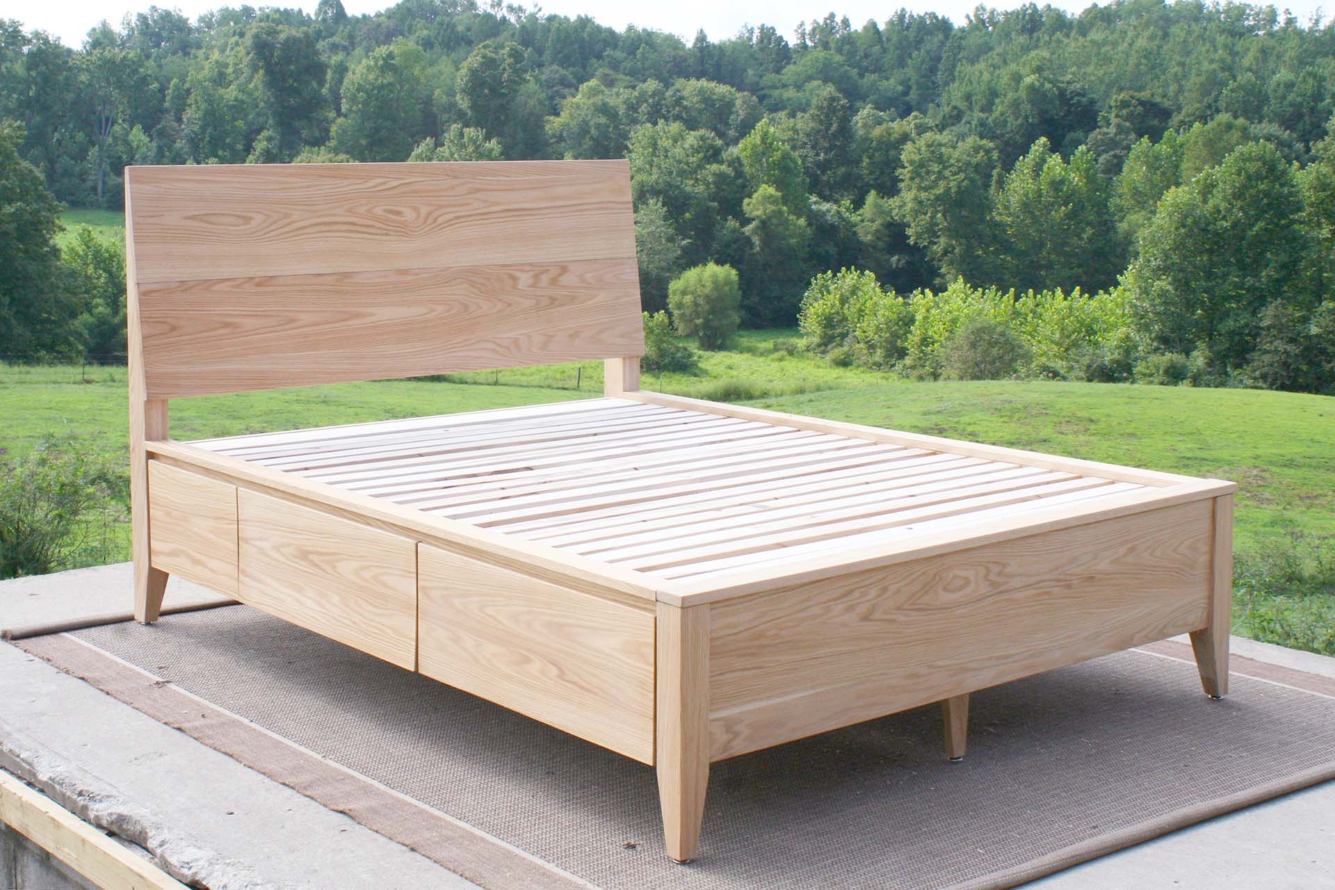 platform storage bed with headboard in maple