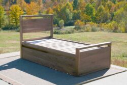 Trundle Bed with top rails on headboard and footboard sde view