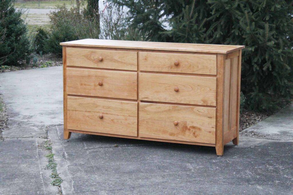 6 Drawer Dresser with paneled ends and overlap drawers side view