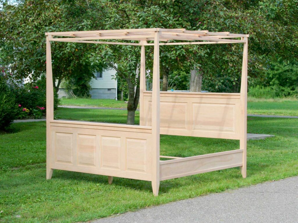 Paneled Canopy Bed with a Box Spring base side view