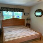 platform bed with arched headboard