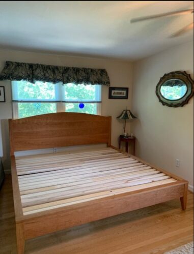 Click to view full screen platform bed with arched headboard