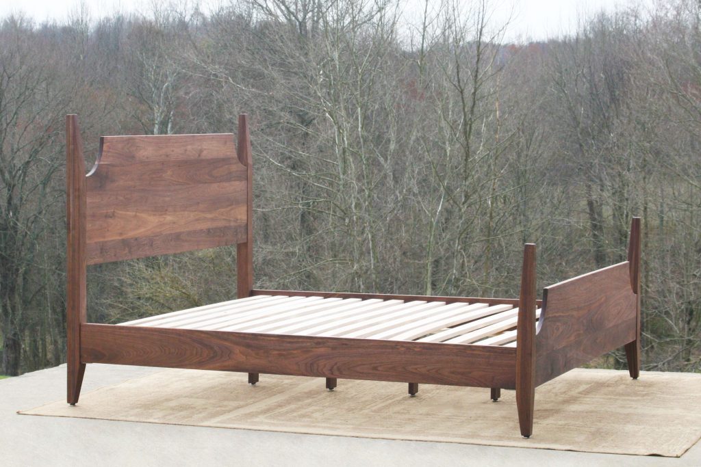 Platform Bed with Elegant Cutouts and Raised Posts