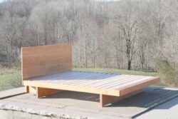 cantilever platform bed with headboard side view Maple